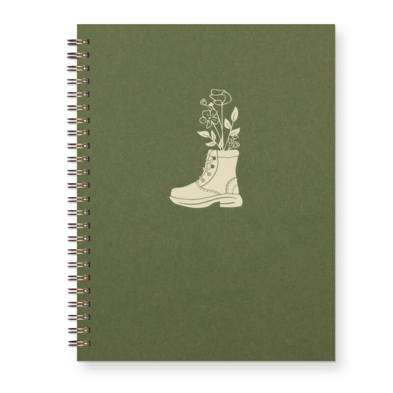 Letterpress journal for nature-lovers that features a hiking boot with a hand-drawn floral bouquet