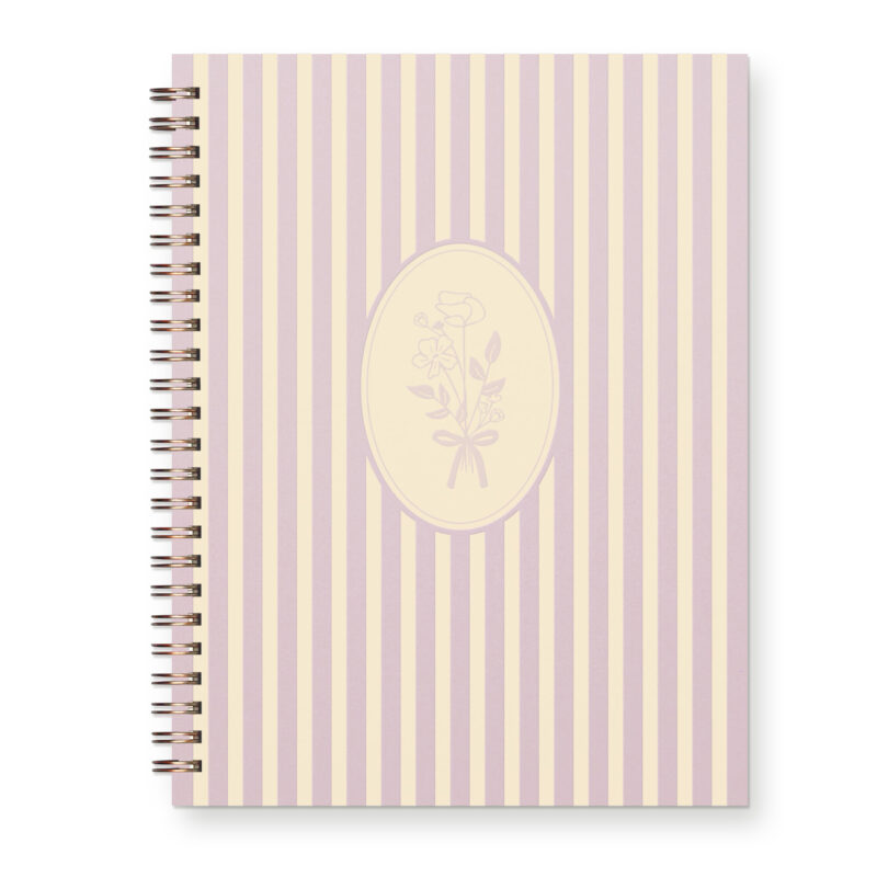 Spiral bound light purple journal with a striped pattern and hand drawn floral design.